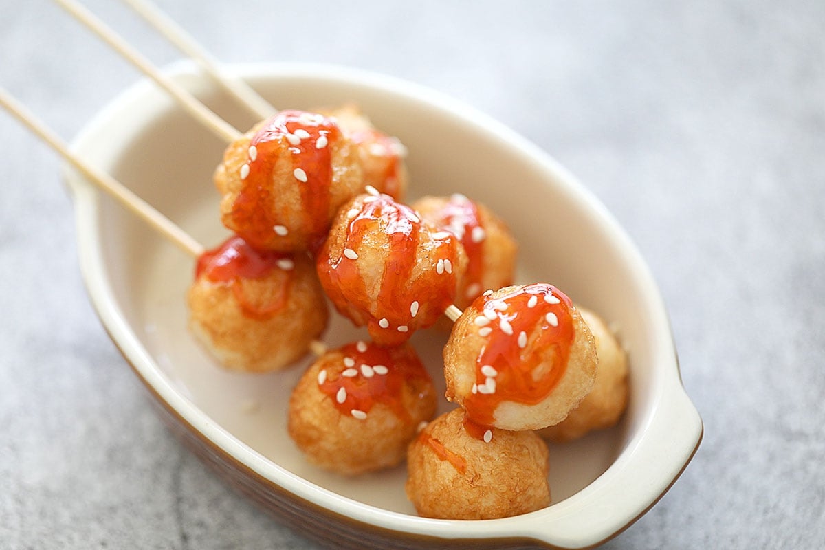 Fried cuttlefish balls on skewers.