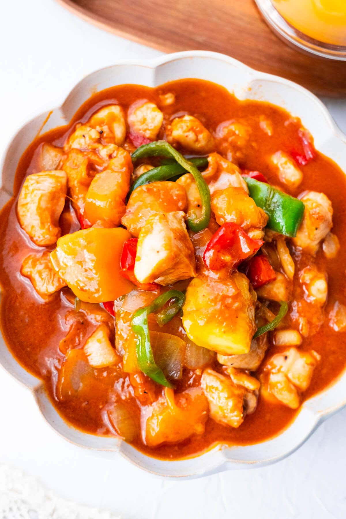 Easy delicious Malaysian mango chicken in a bowl.