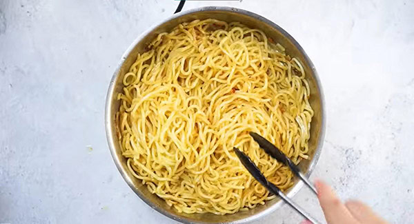 Garlic noodles in a skillet.