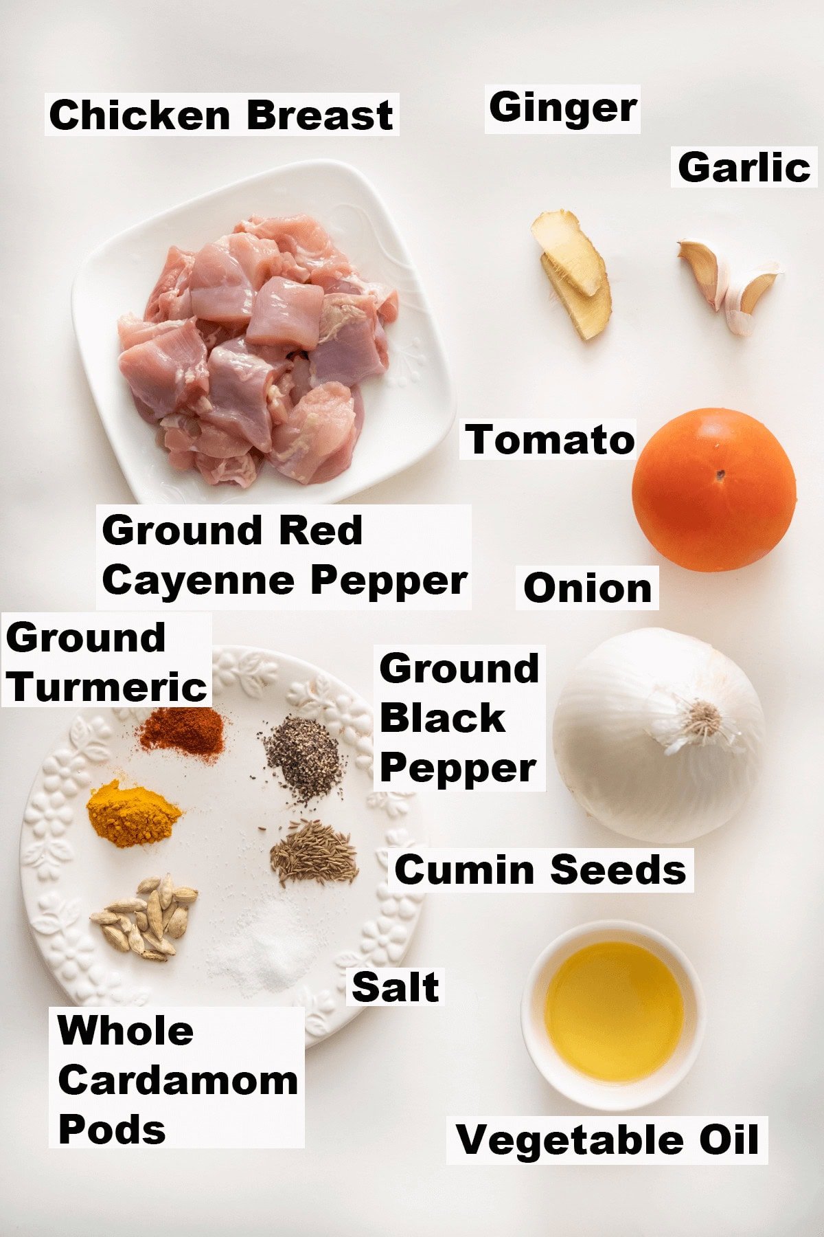 Ingredients for cardamom chicken (masala murgh) recipe. 