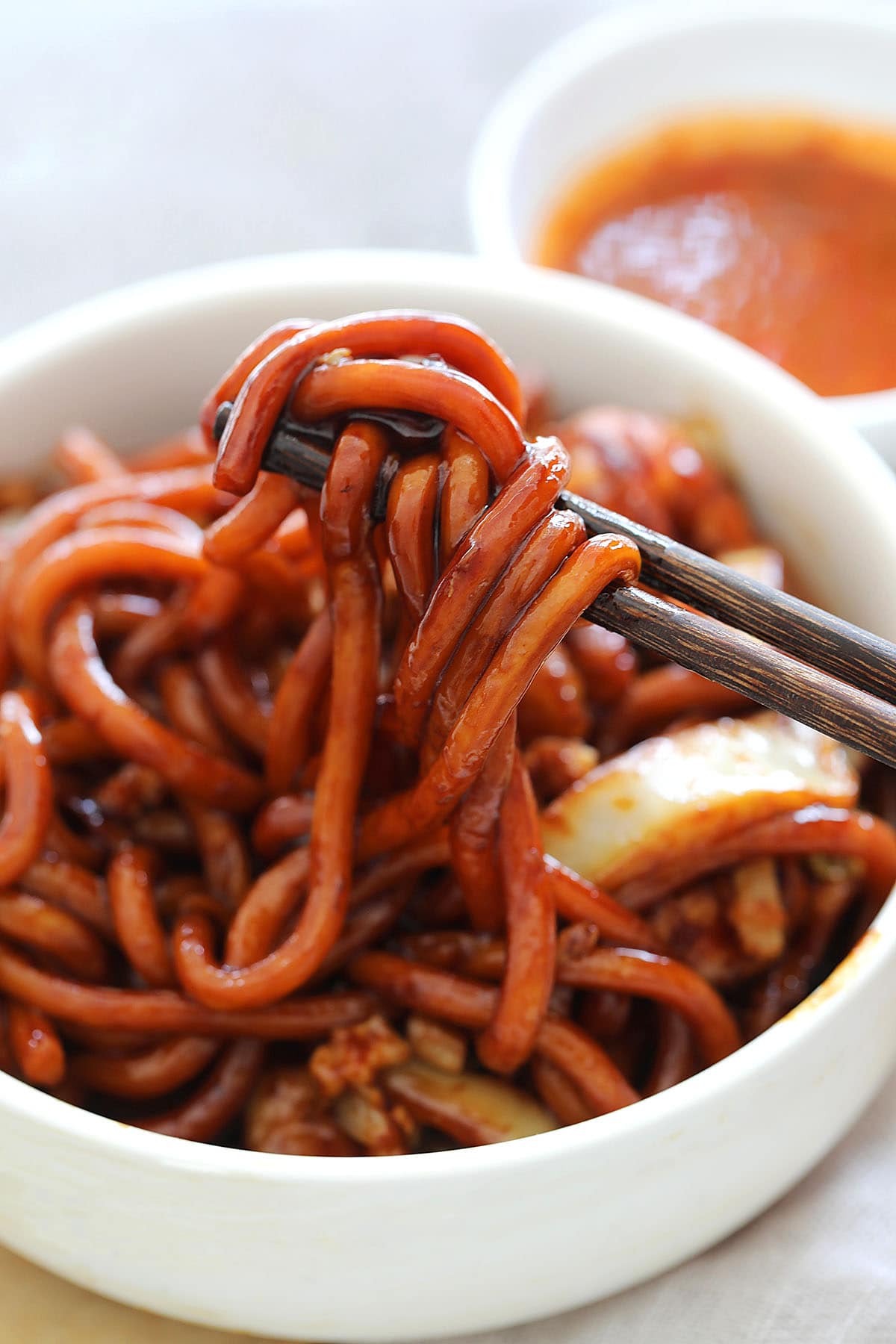 KL Hokkien mee picked up with chopsticks.