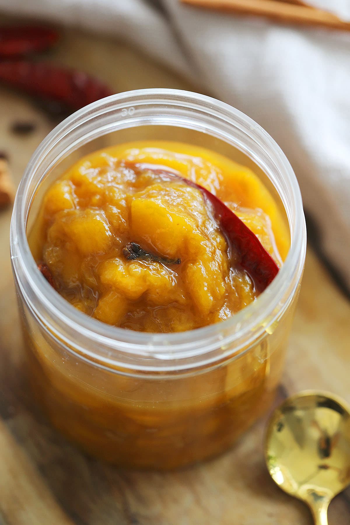 Mango chutney in a container.