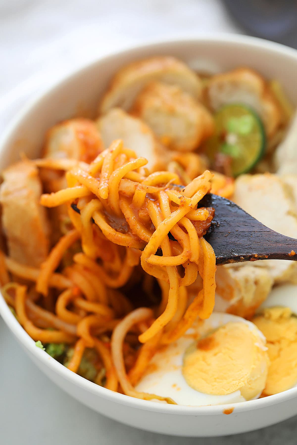 Mee rebus served with fork. 