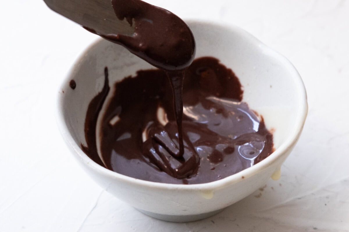 Mix condensed milk, cocoa powder and oil in a small bowl. 