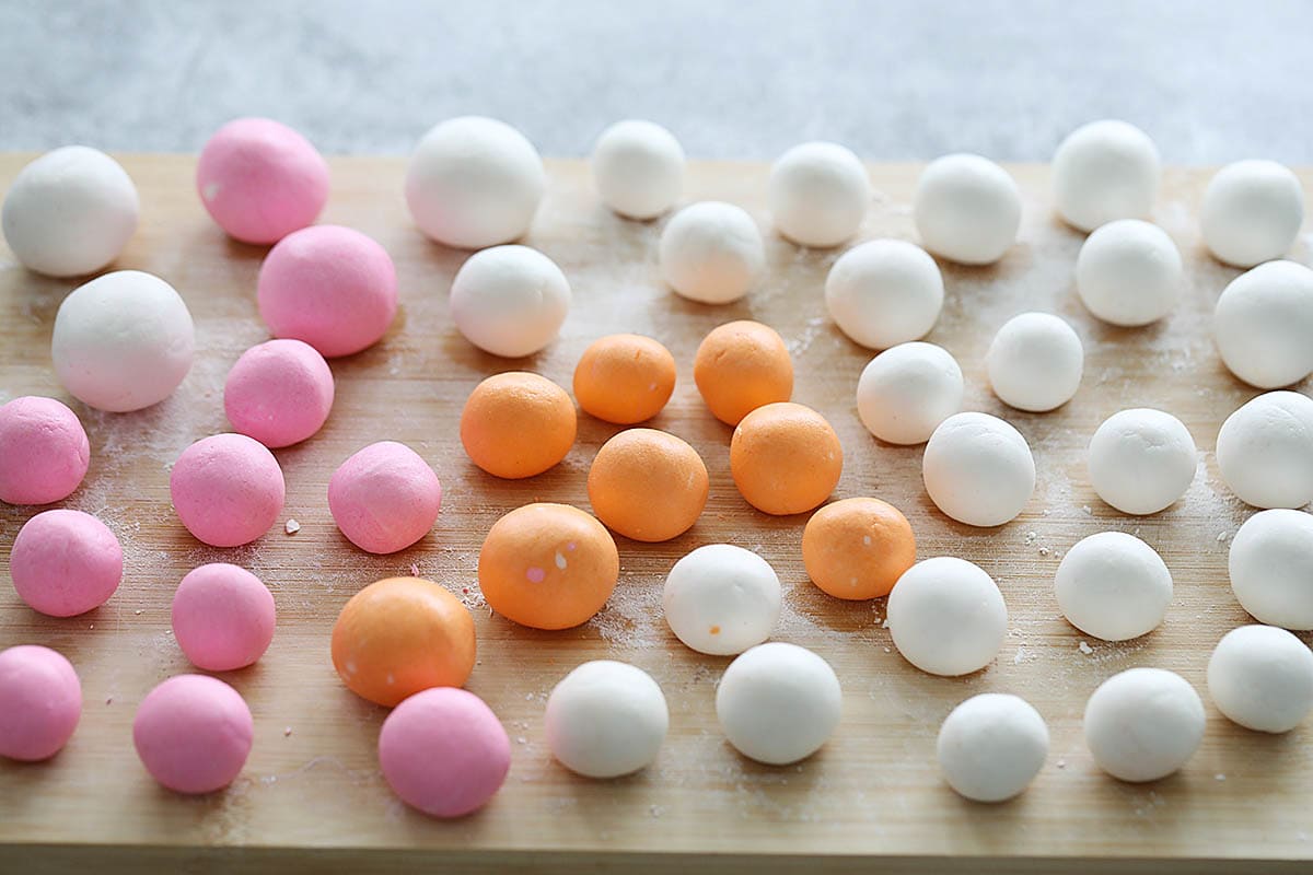 Tangyuan dumplings rolled into small rice balls.