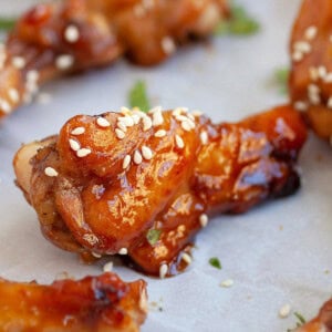 Honey soy chicken wings topped with sesame seeds.