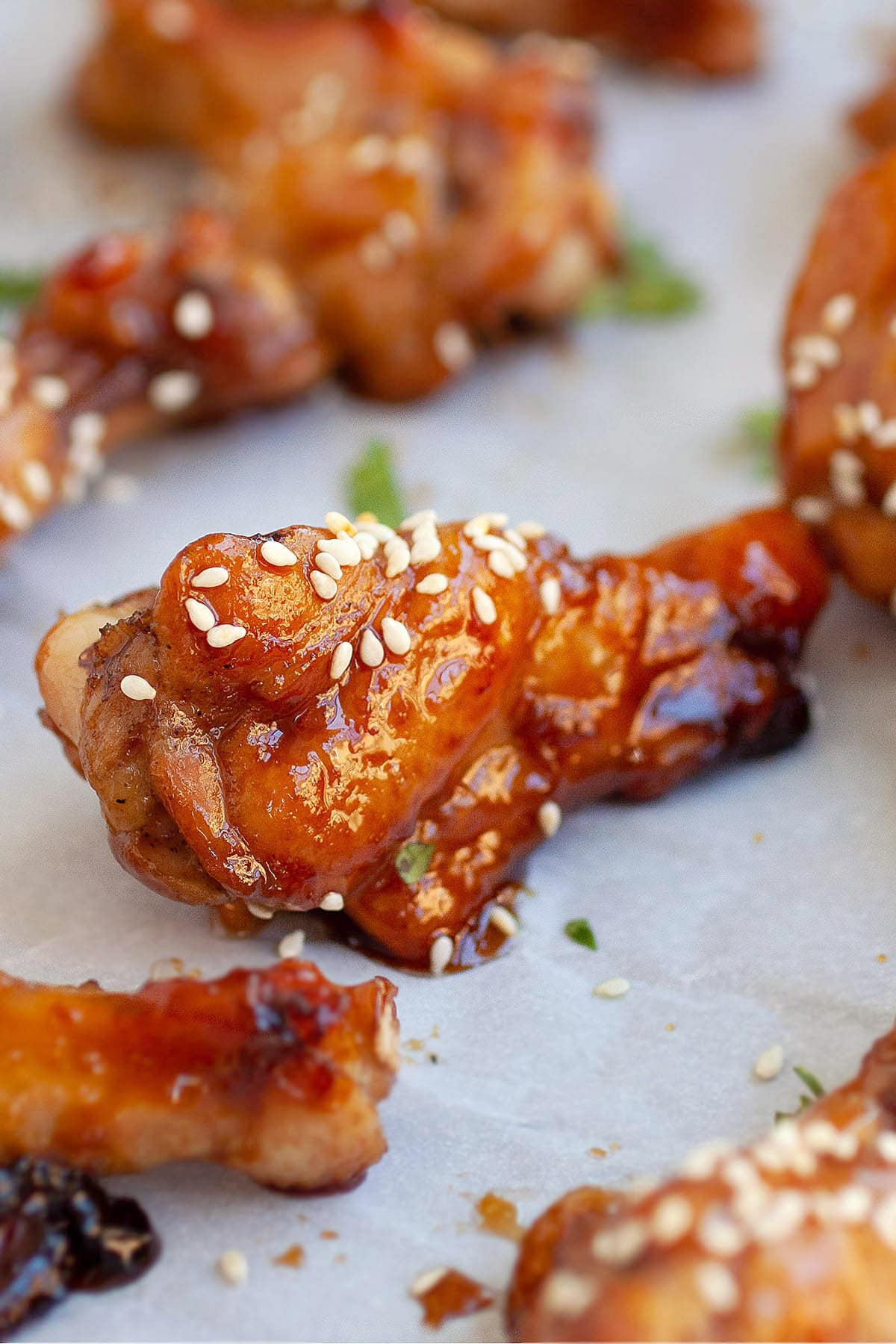 Honey soy chicken wings topped with sesame seeds.