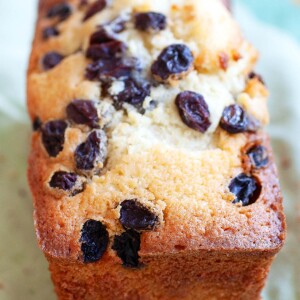 A loaf of cake with raisins.