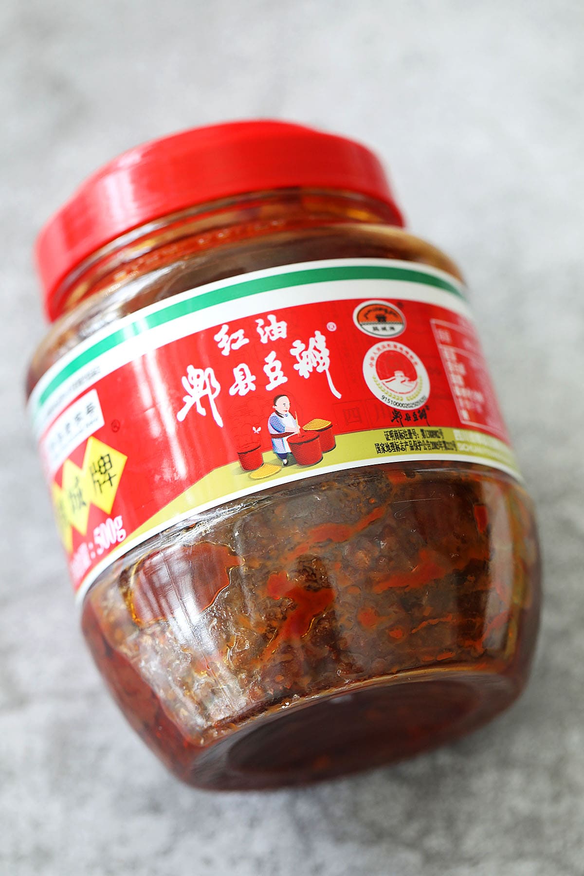 A bottle of spicy bean sauce (spicy doubanjiang).