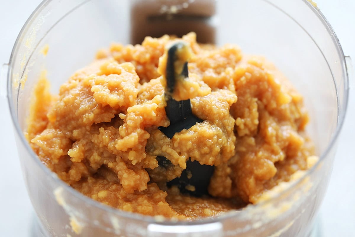 Blending coconut kaya jam inside a food processor.