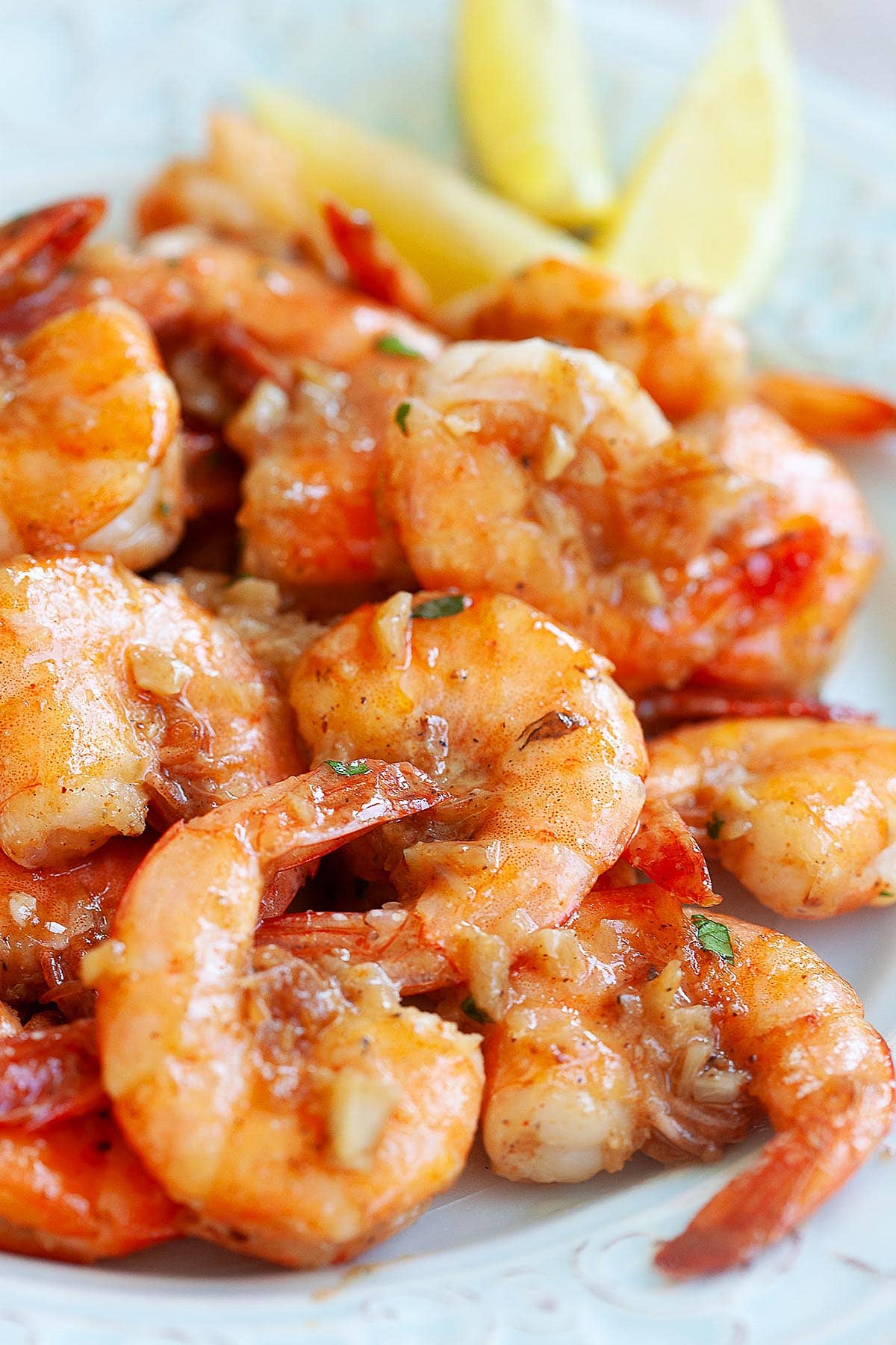 Hawaiian garlic shrimp inspired by the iconic shrimp food truck of Oahu’s North Shore, served with lemon wedges.