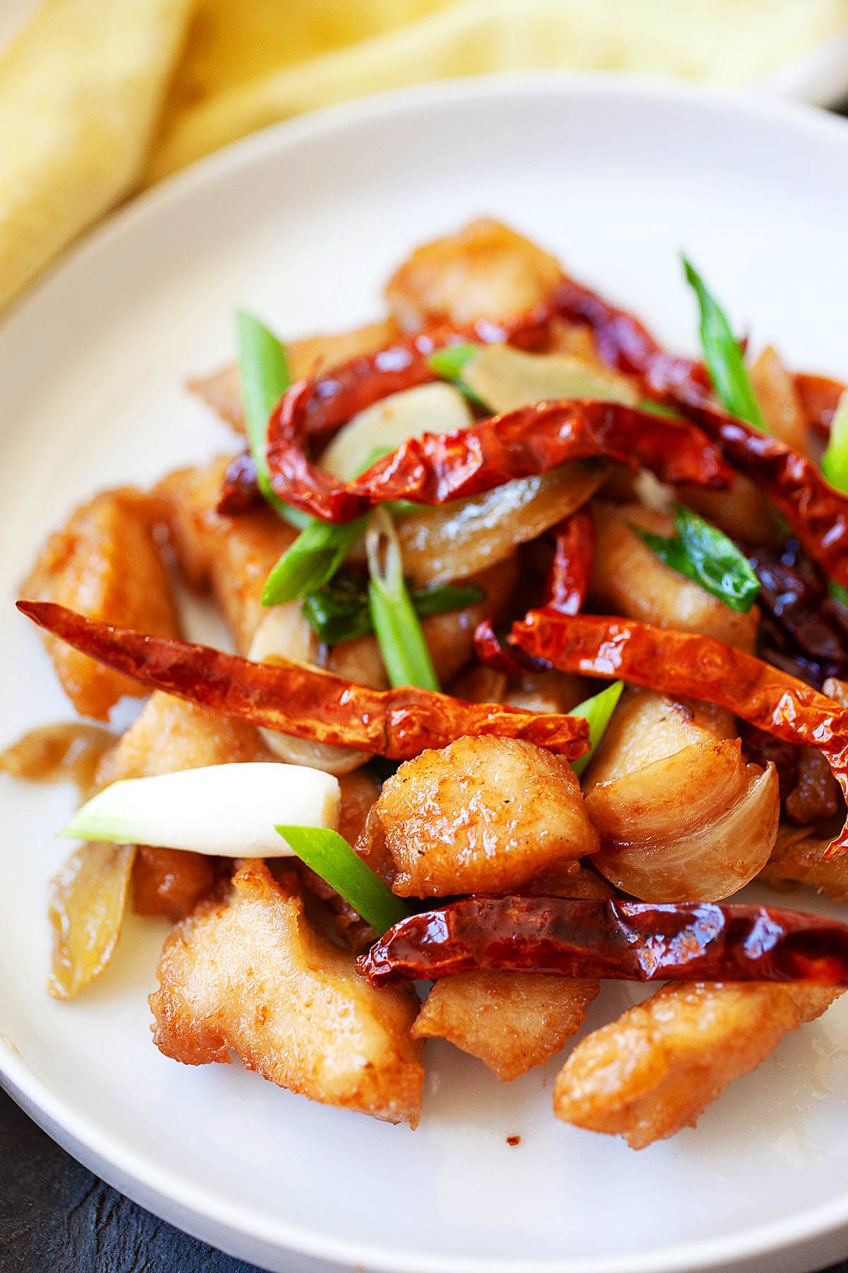 Mala chicken with dried red chilies and scallions.