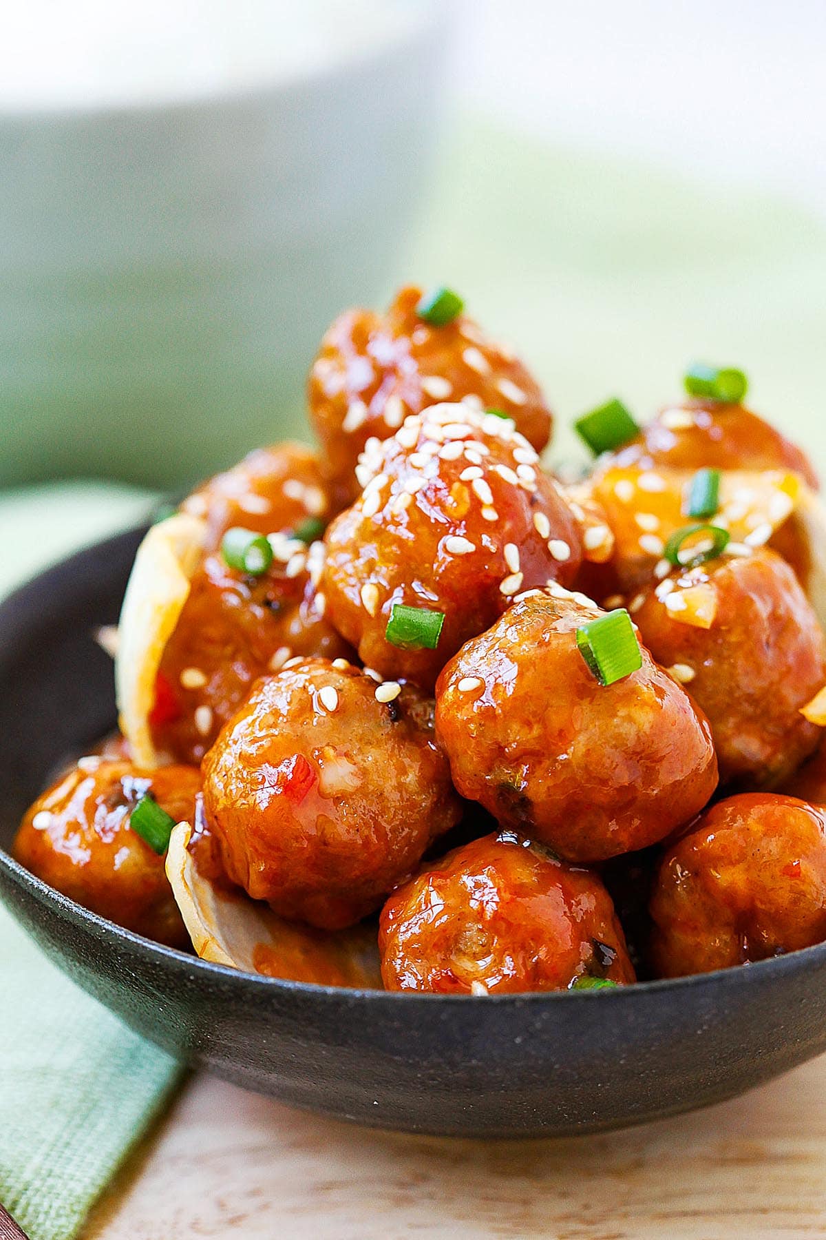 Sweet and sour meatballs recipe with ketchup and Thai sweet chili sauce.