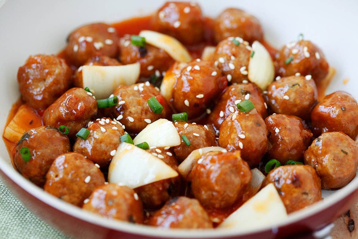 Sweet and sour meatballs, glistening with homemade sweet and sour sauce.