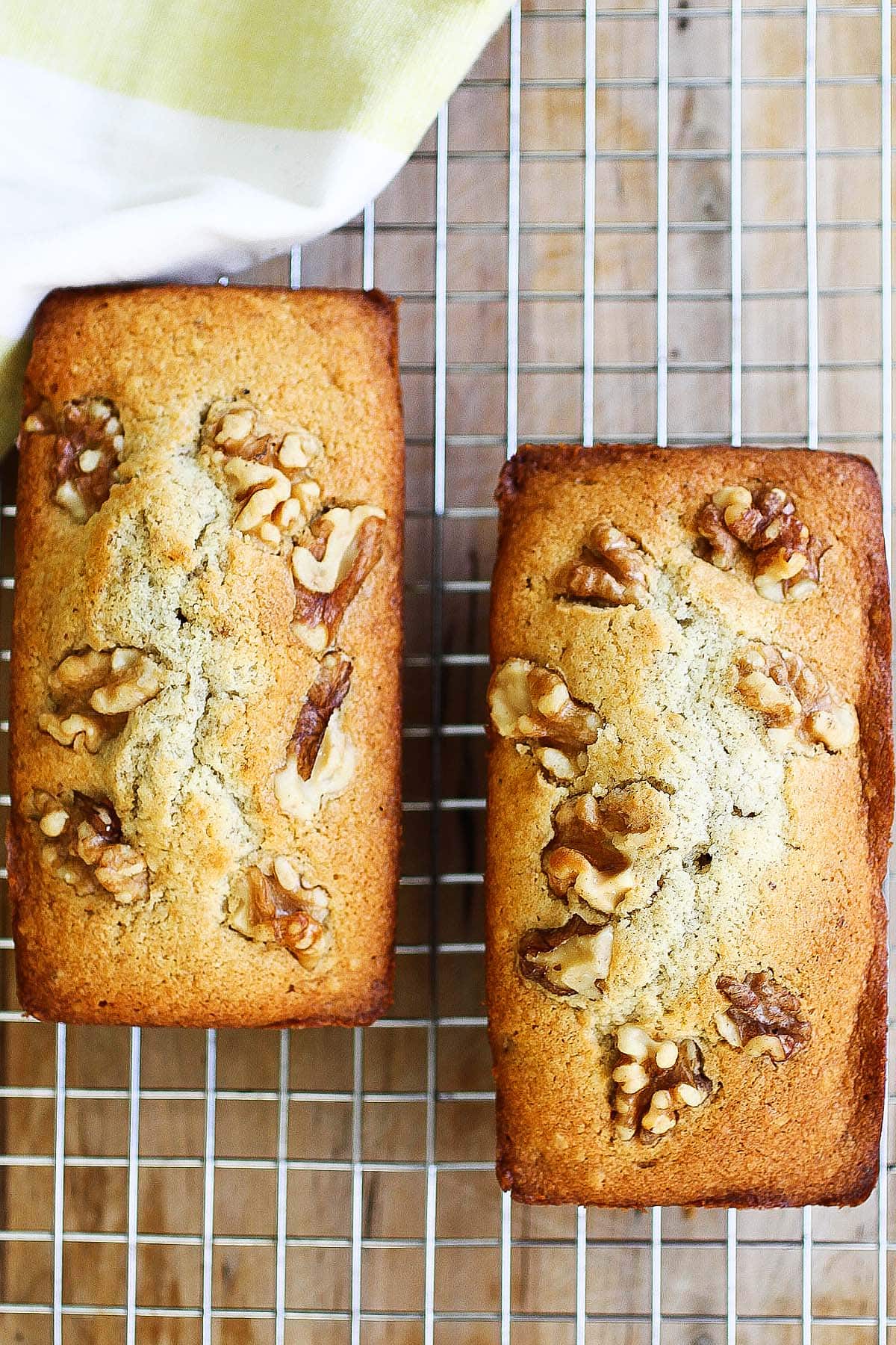 Walnut cake on a rack.