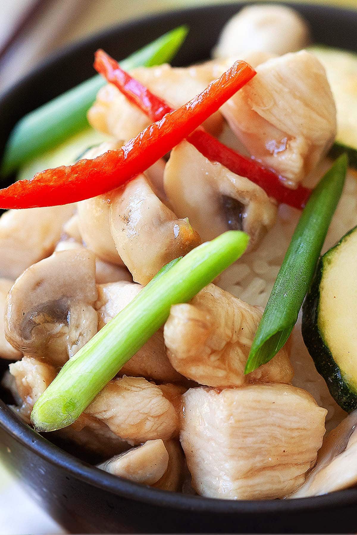 Zucchini chicken with tender chicken cubes, zucchini and mushrooms.