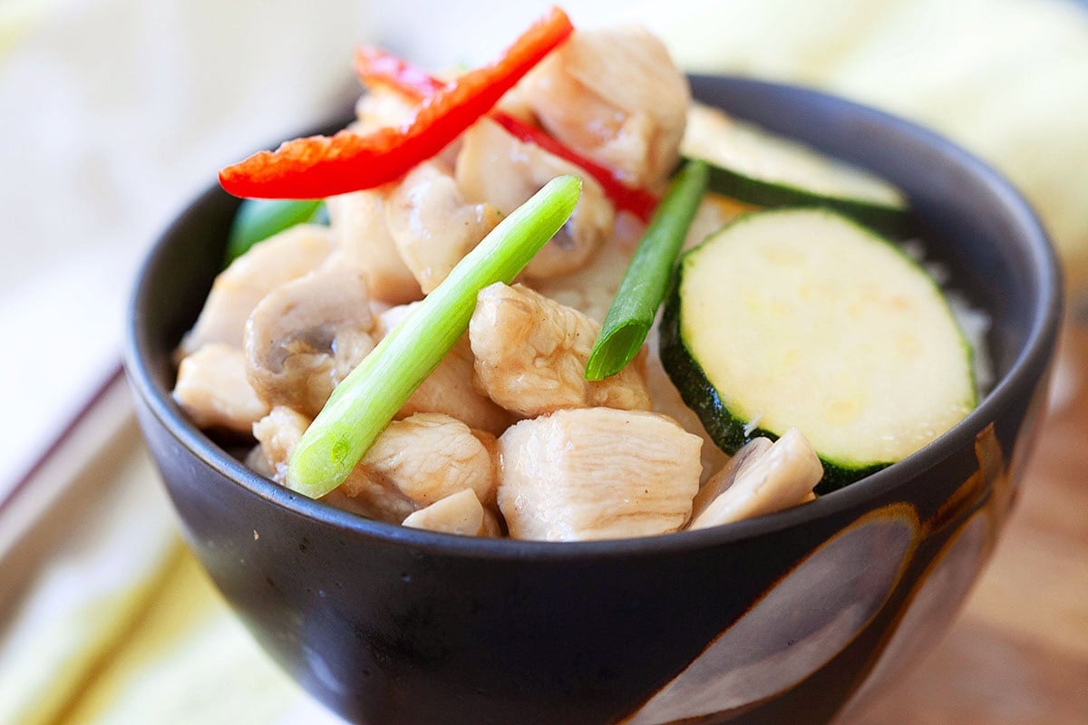 Chicken zucchini mushroom stir fry served with steamed rice. 