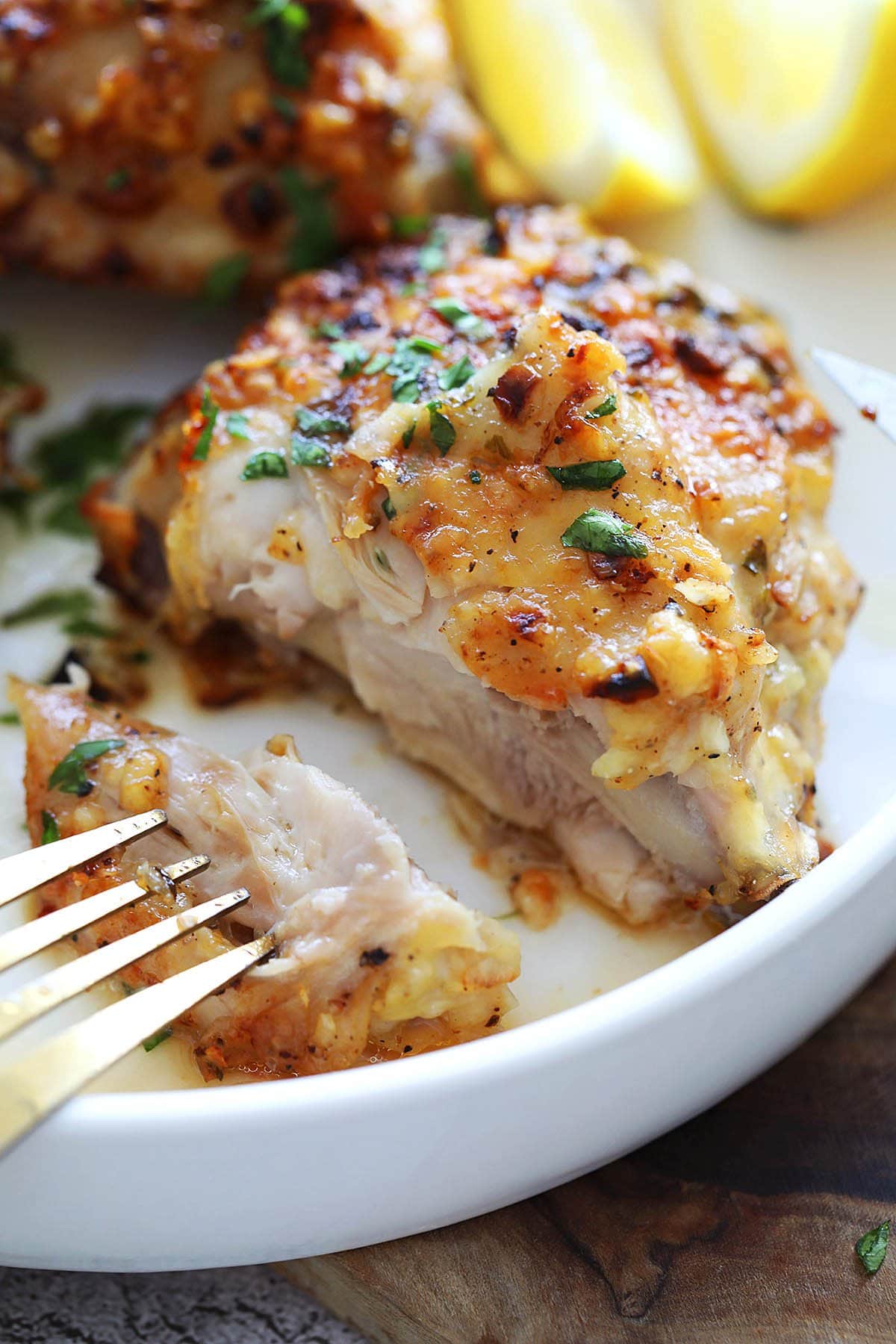 Juicy air fryer chicken thighs with a savory garlic parmesan seasoning.