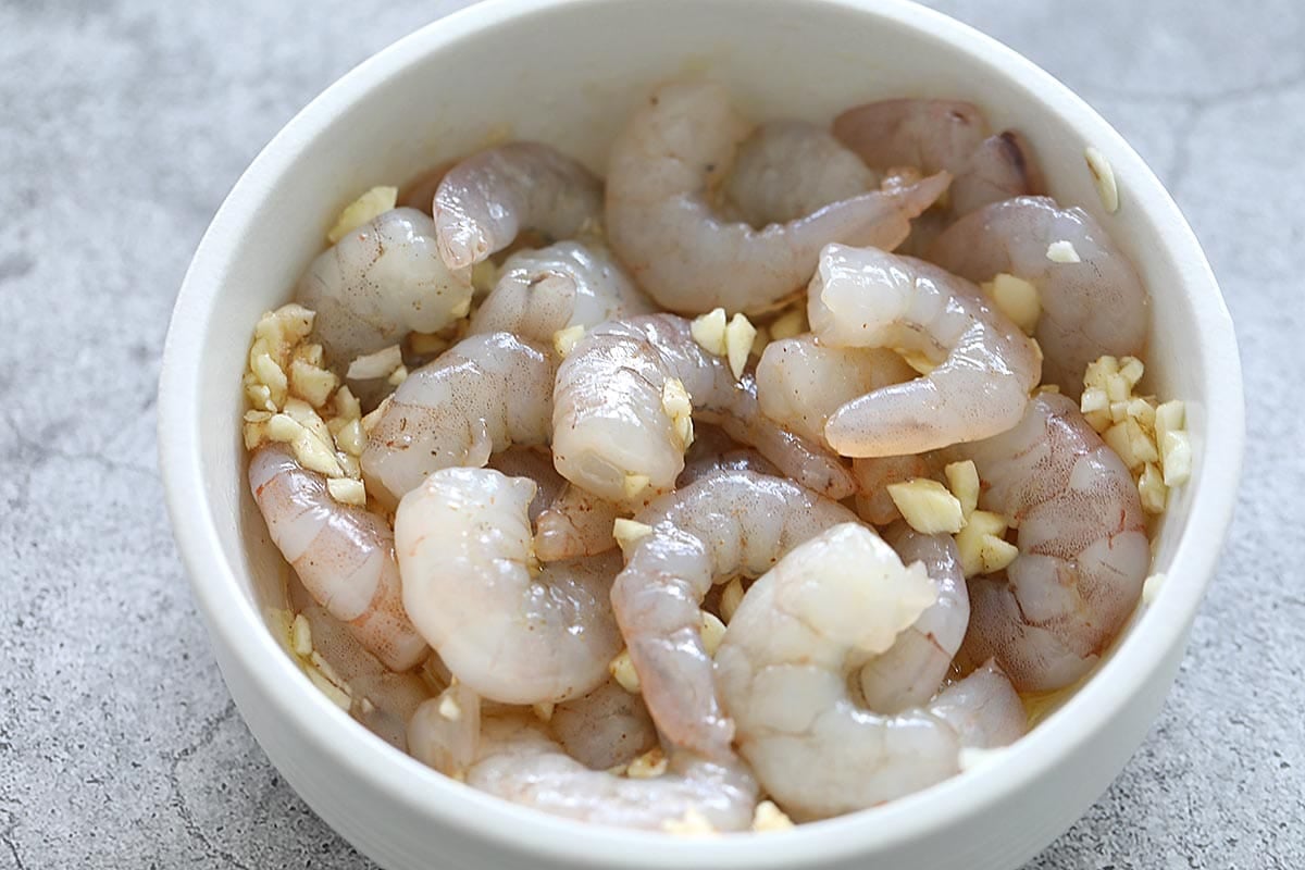 Shrimp with honey garlic sauce in a bowl.