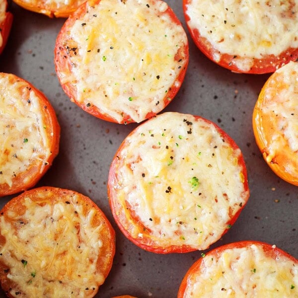 Parmesan baked tomatoes served as a flavorful side dish.