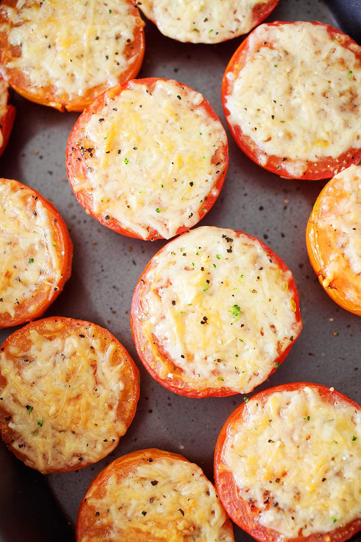 Parmesan baked tomatoes served as a flavorful side dish.