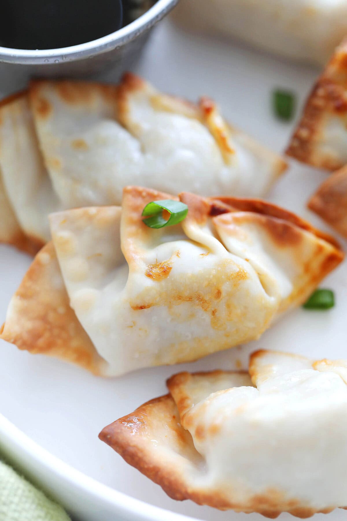 Golden brown air fryer gyoza with crispy edges.