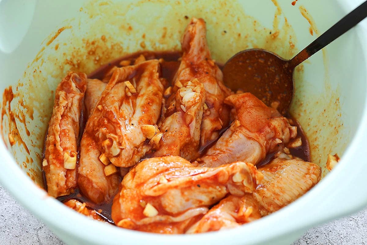 Chicken wings marinated in gochujang sauce.