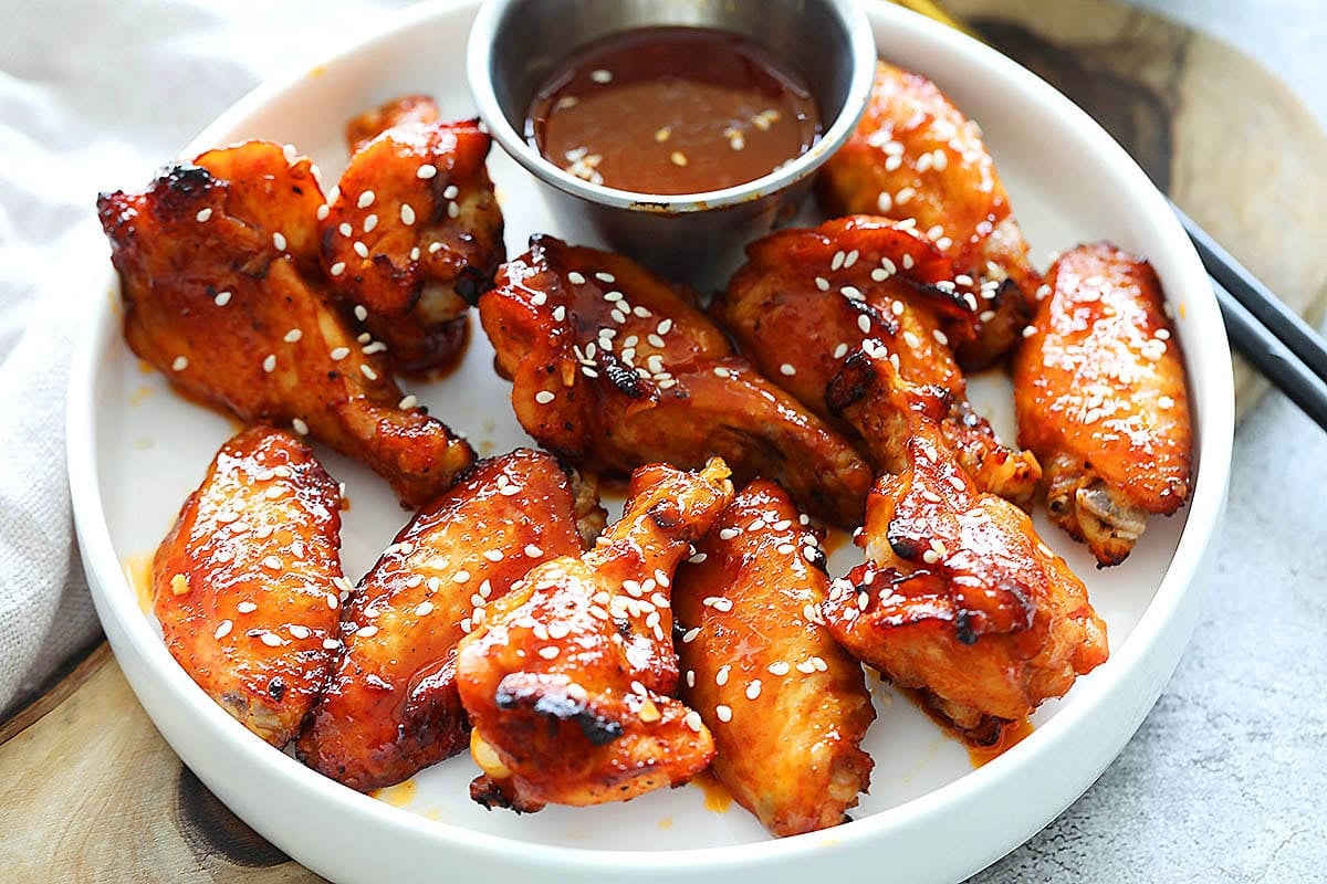 Air fryer gochujang chicken wings served on a plate.