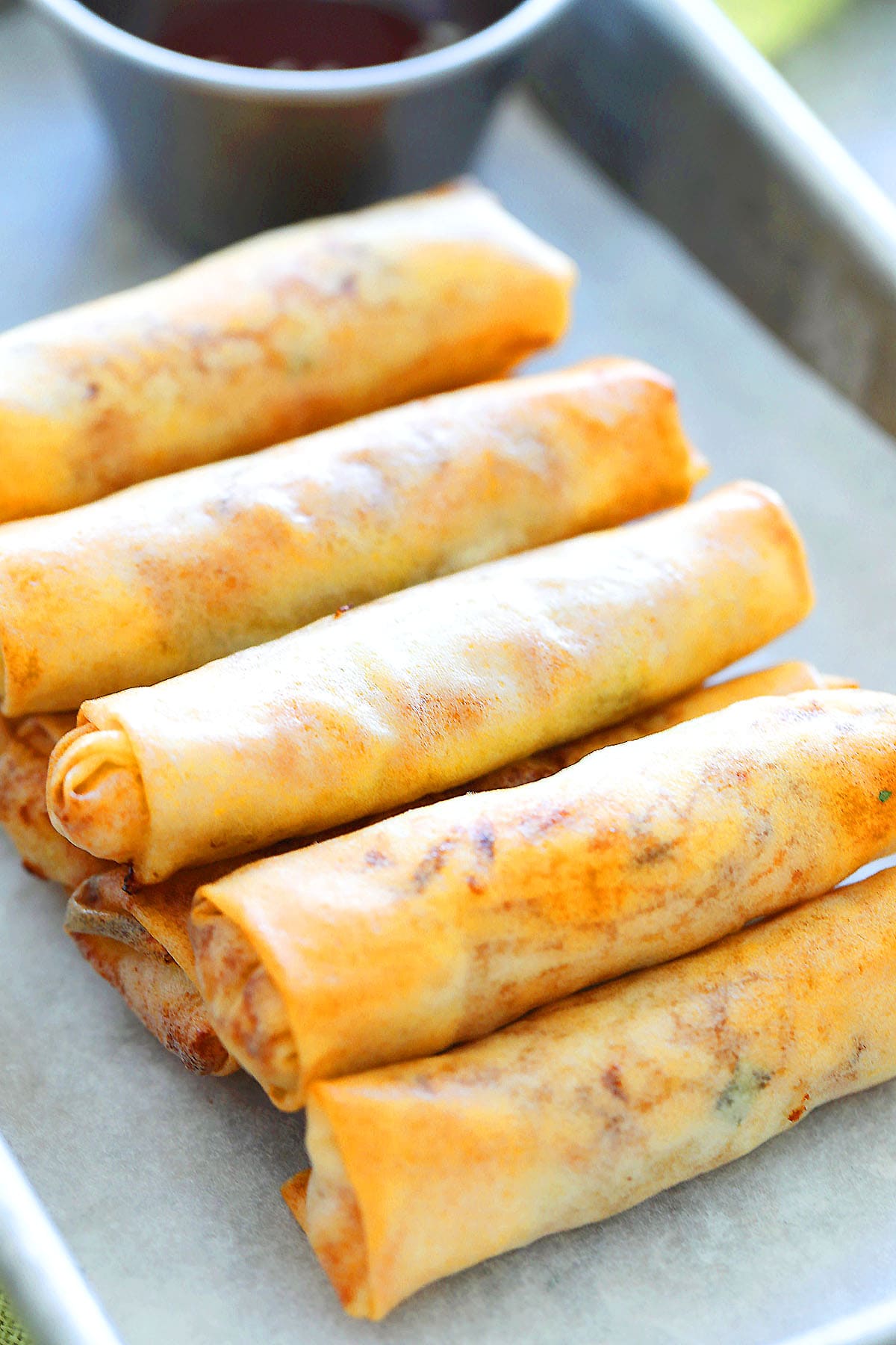 Air fryer spring rolls with golden-brown, crispy wrappers.