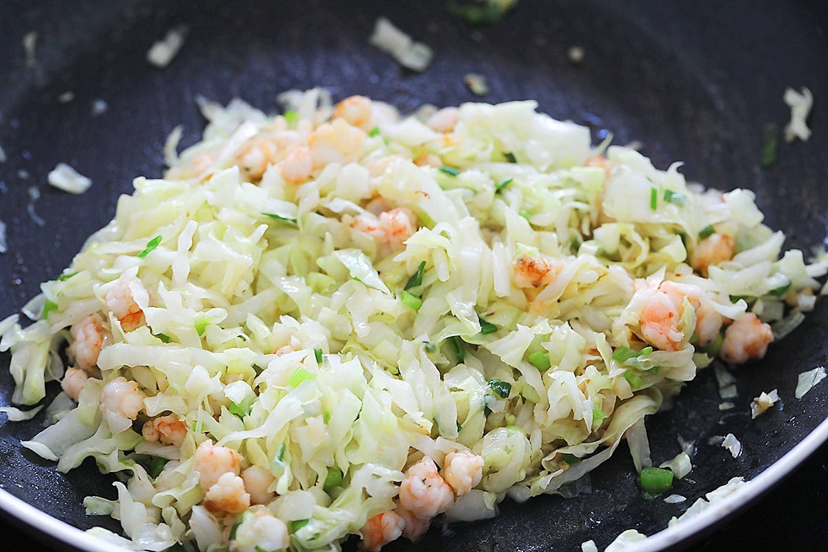 Spring roll filling in a skillet.