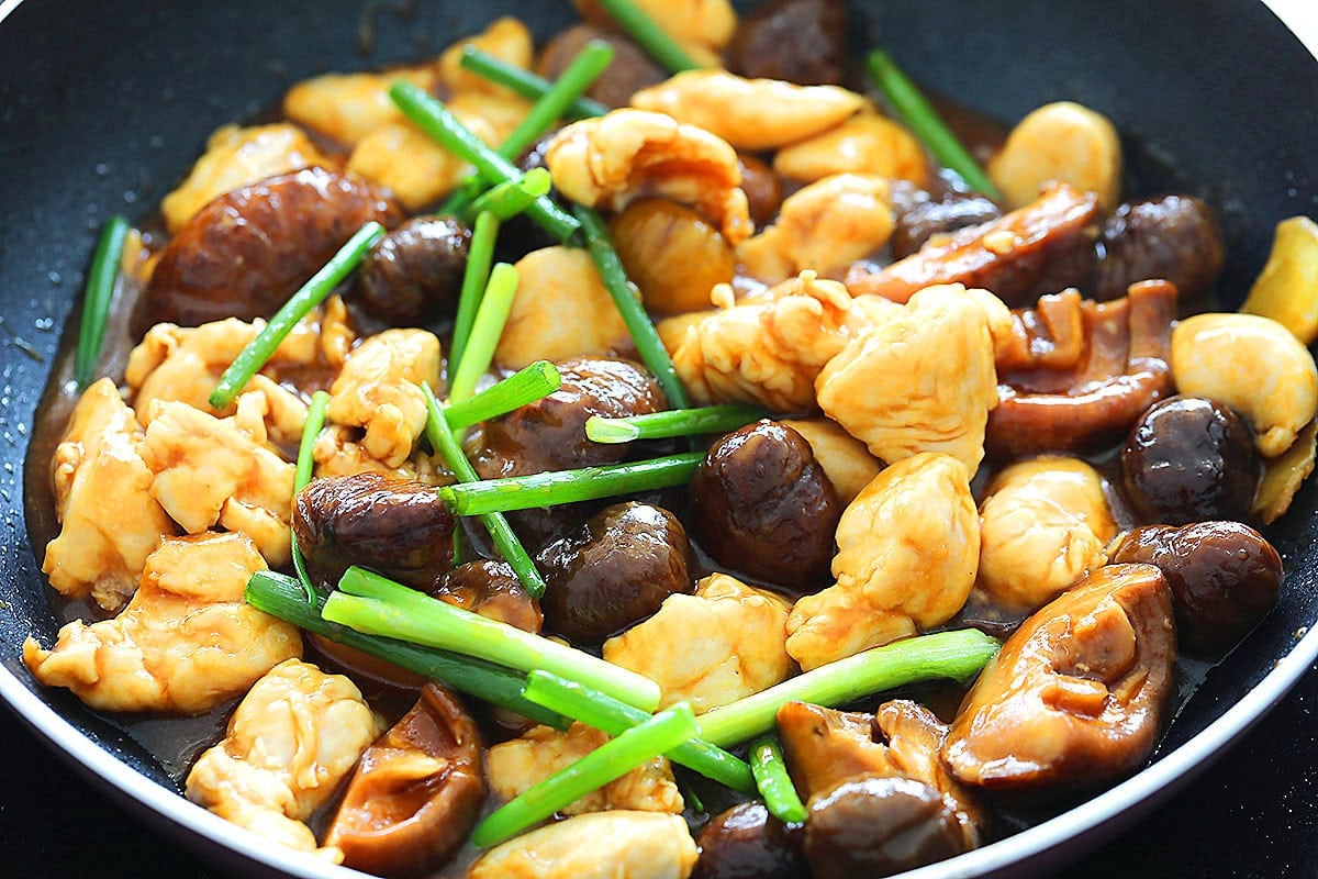 Chestnut chicken with roasted chestnuts, topped with scallions.