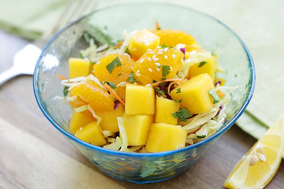Asian fruit salad with tropical fruits served in a bowl.