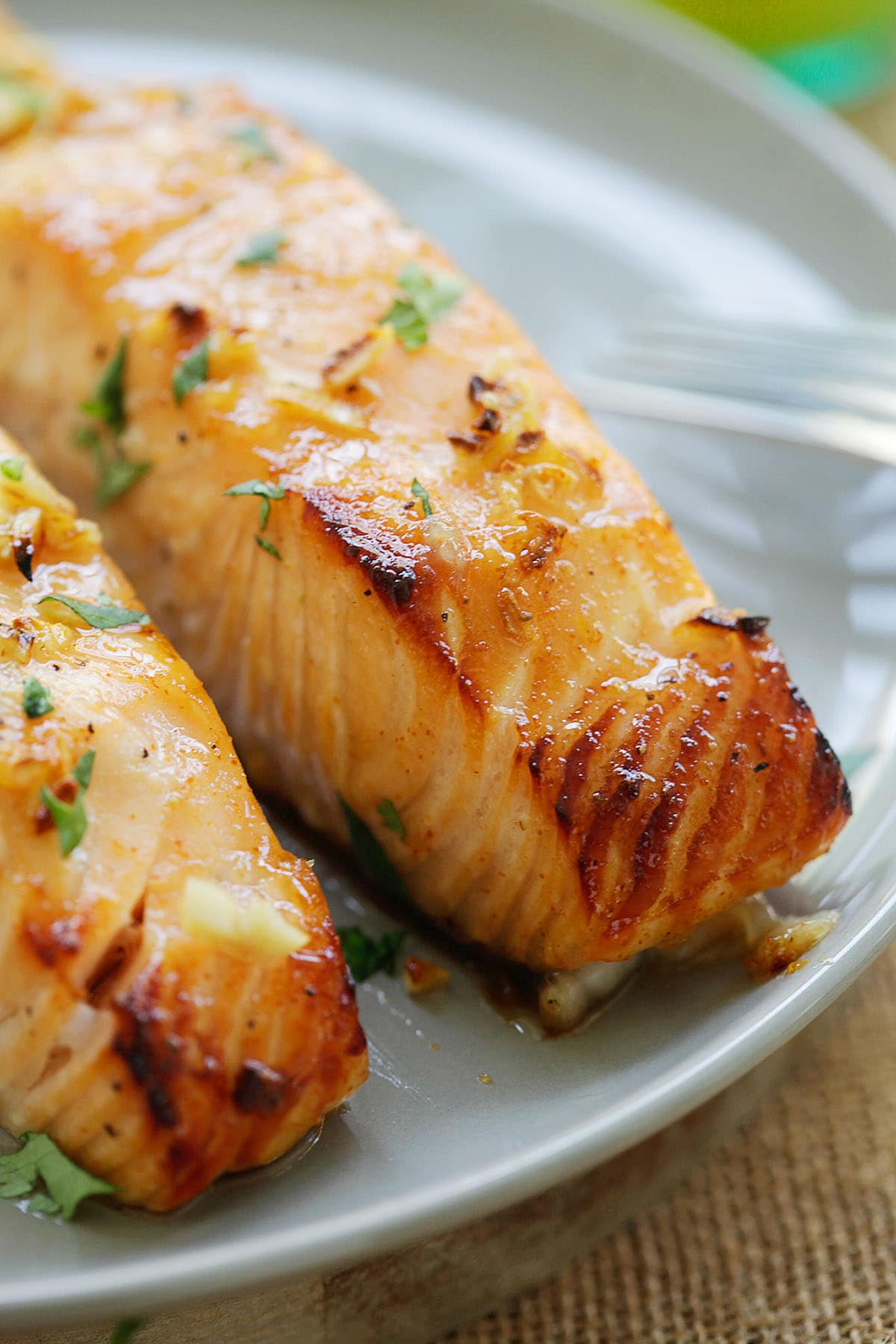 Honey mustard glazed salmon served on a plate.