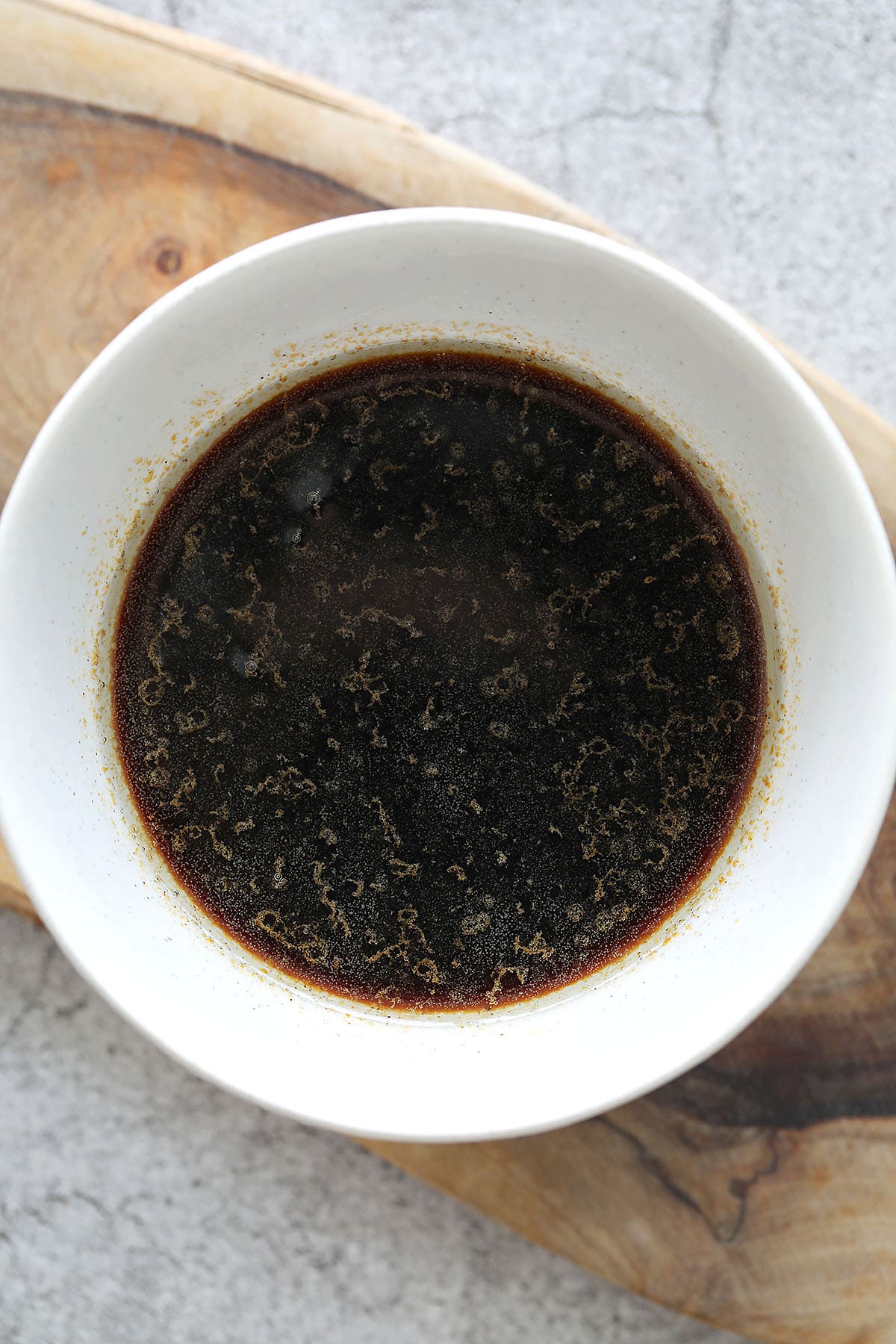 Chinese style steamed fish sauce in a bowl.