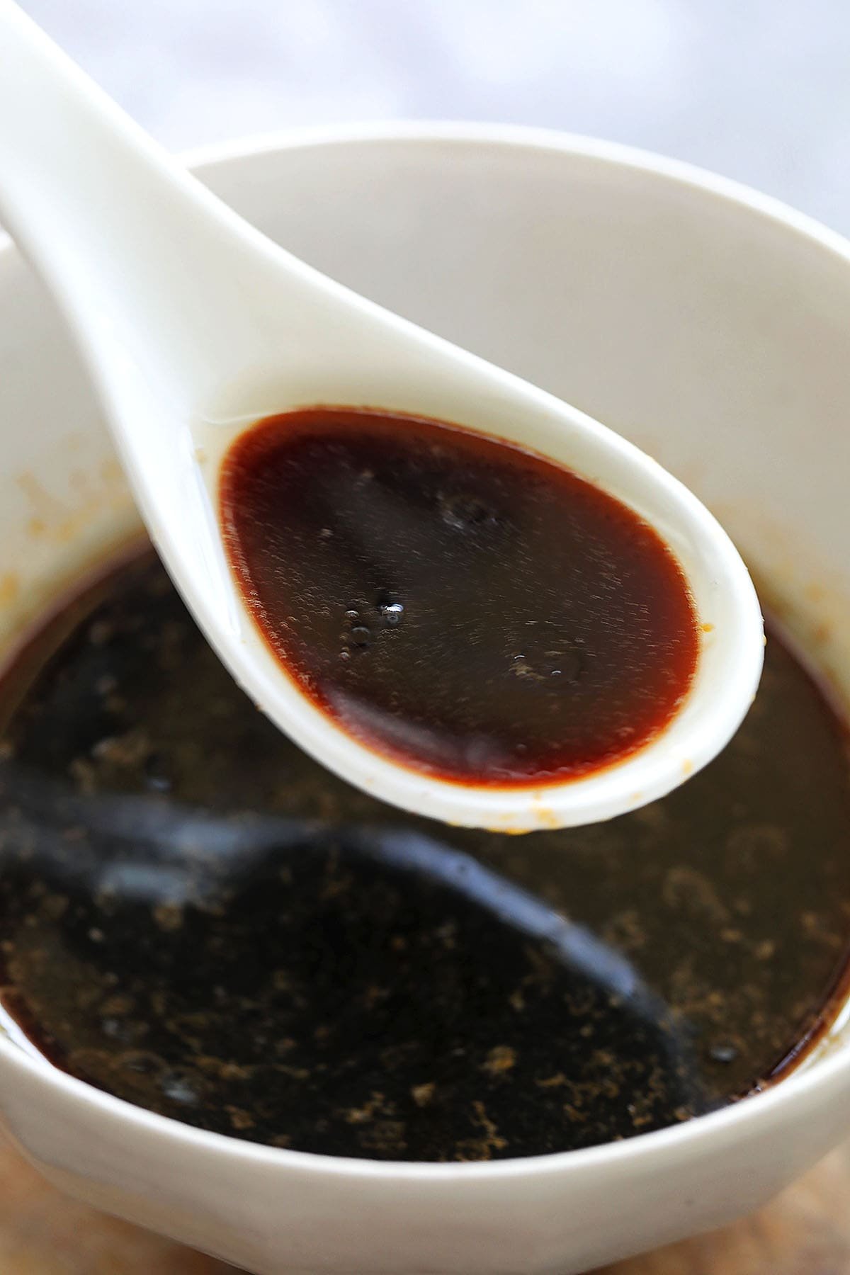 Spoonful of Cantonese style steamed fish sauce.