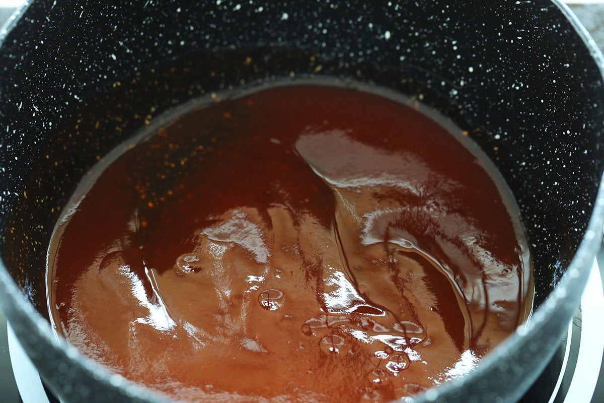 Sweet and sour sauce in a saucepan.