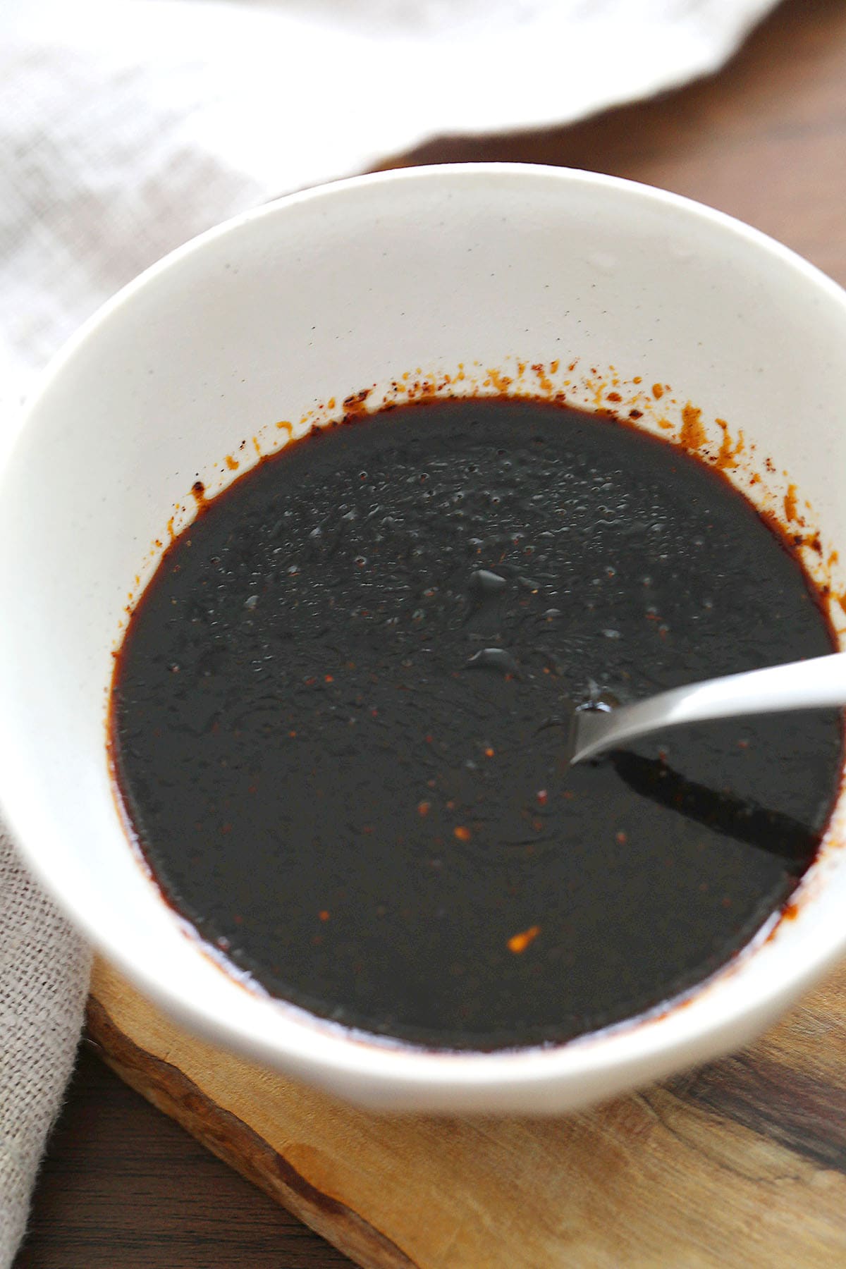 Homemade char siu sauce in a bowl.