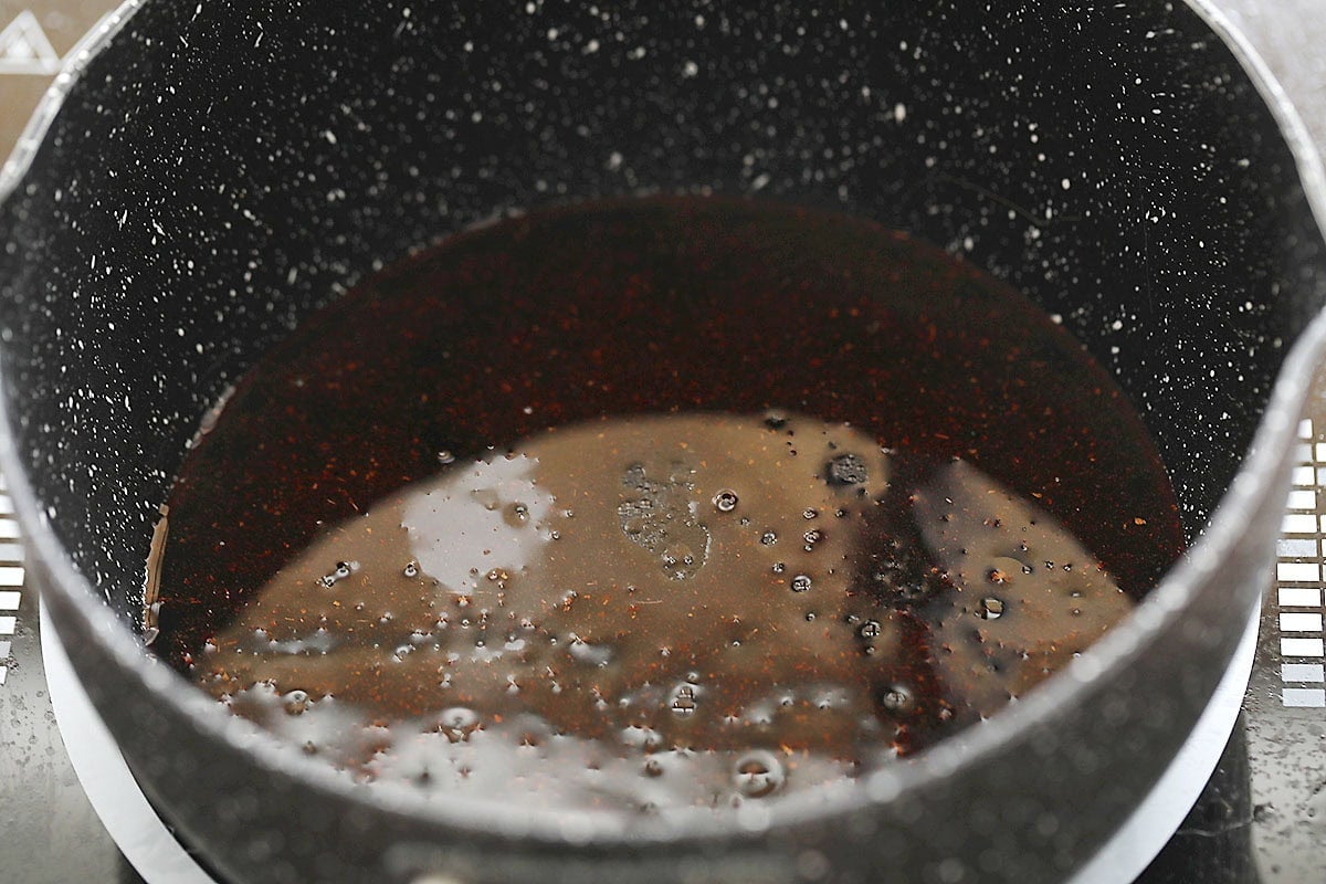 Homemade char siu sauce recipe in a saucepan.