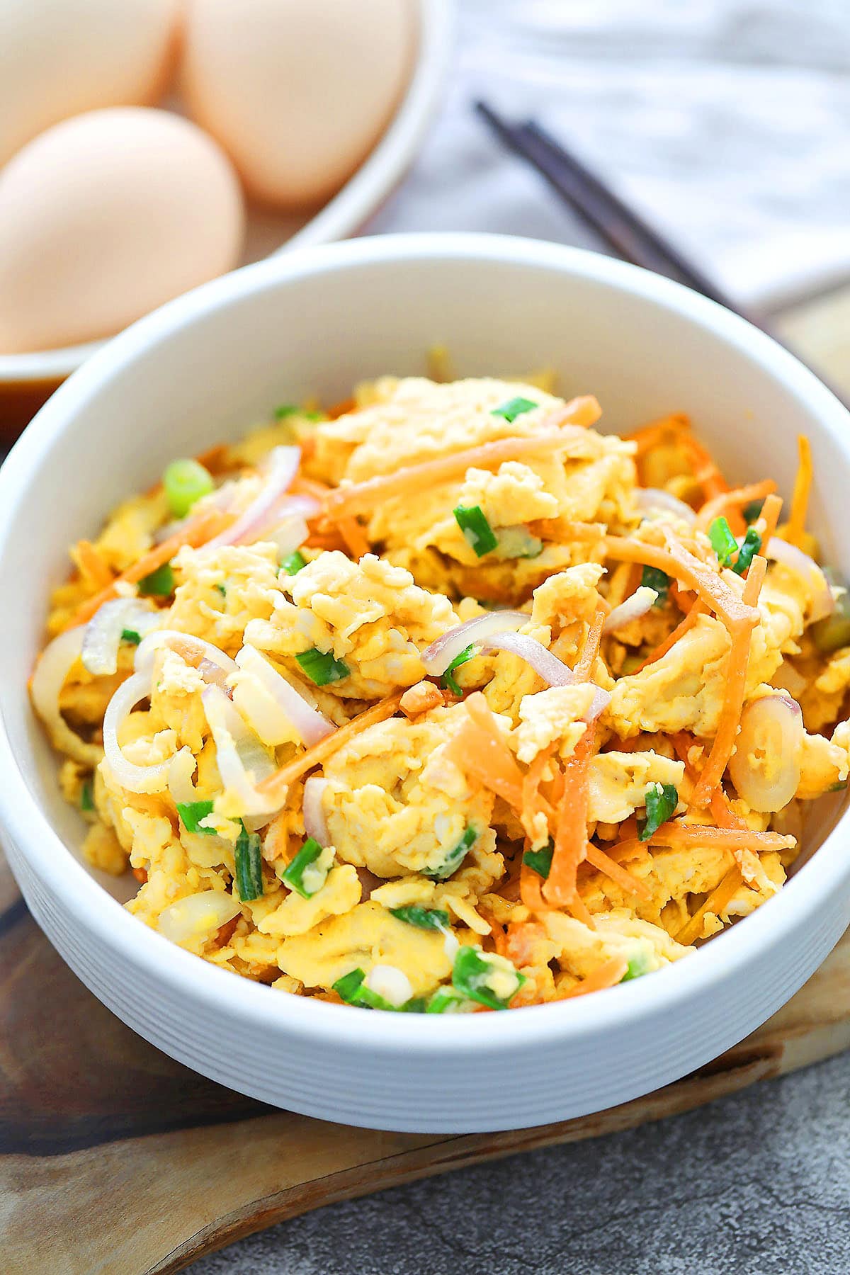 Soft Chinese scrambled eggs recipe with carrots and onions.