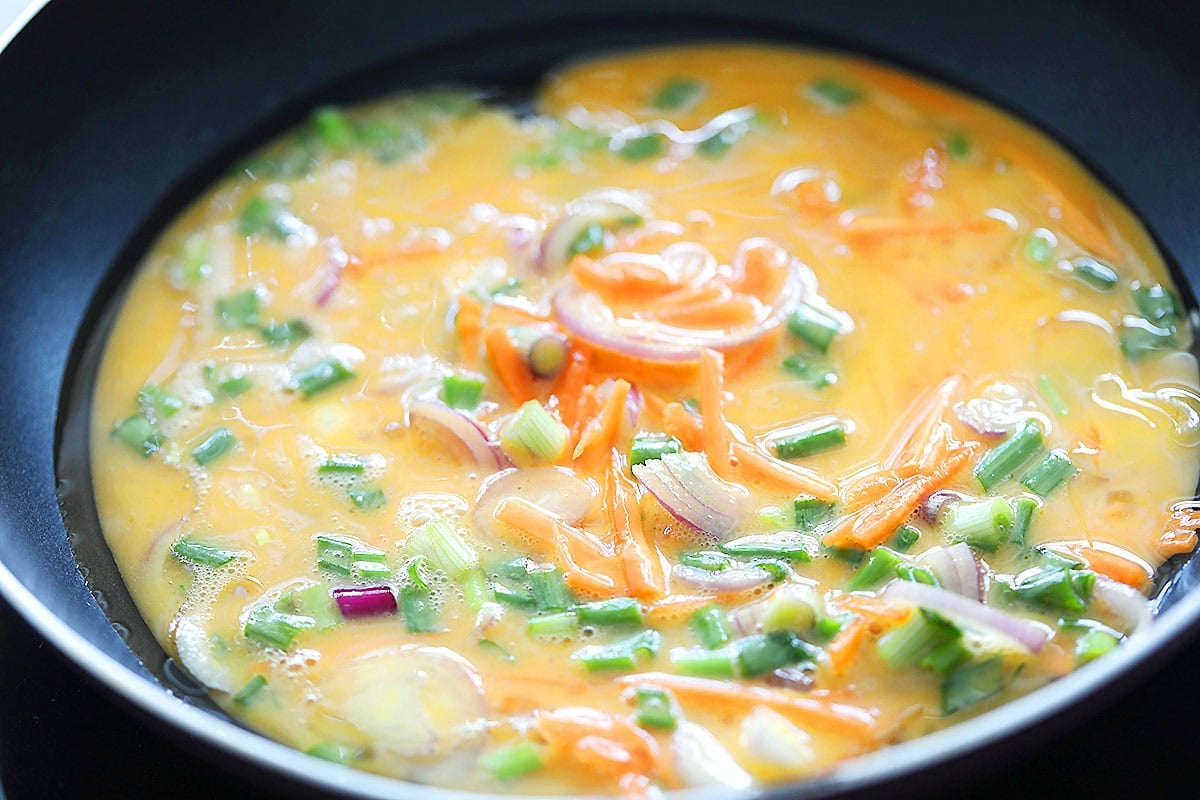 Egg mixture in a skillet.