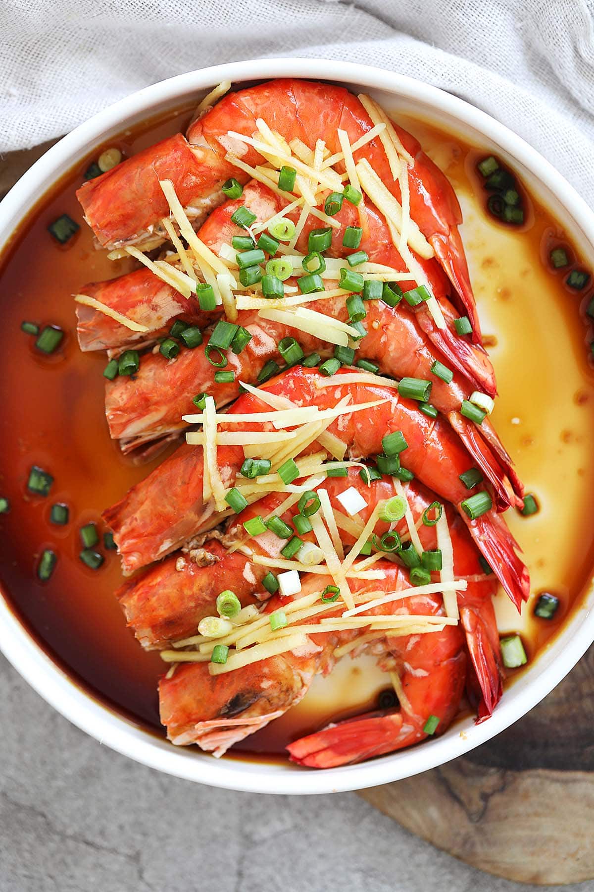 Chinese steamed shrimp with savory soy-based sauce.