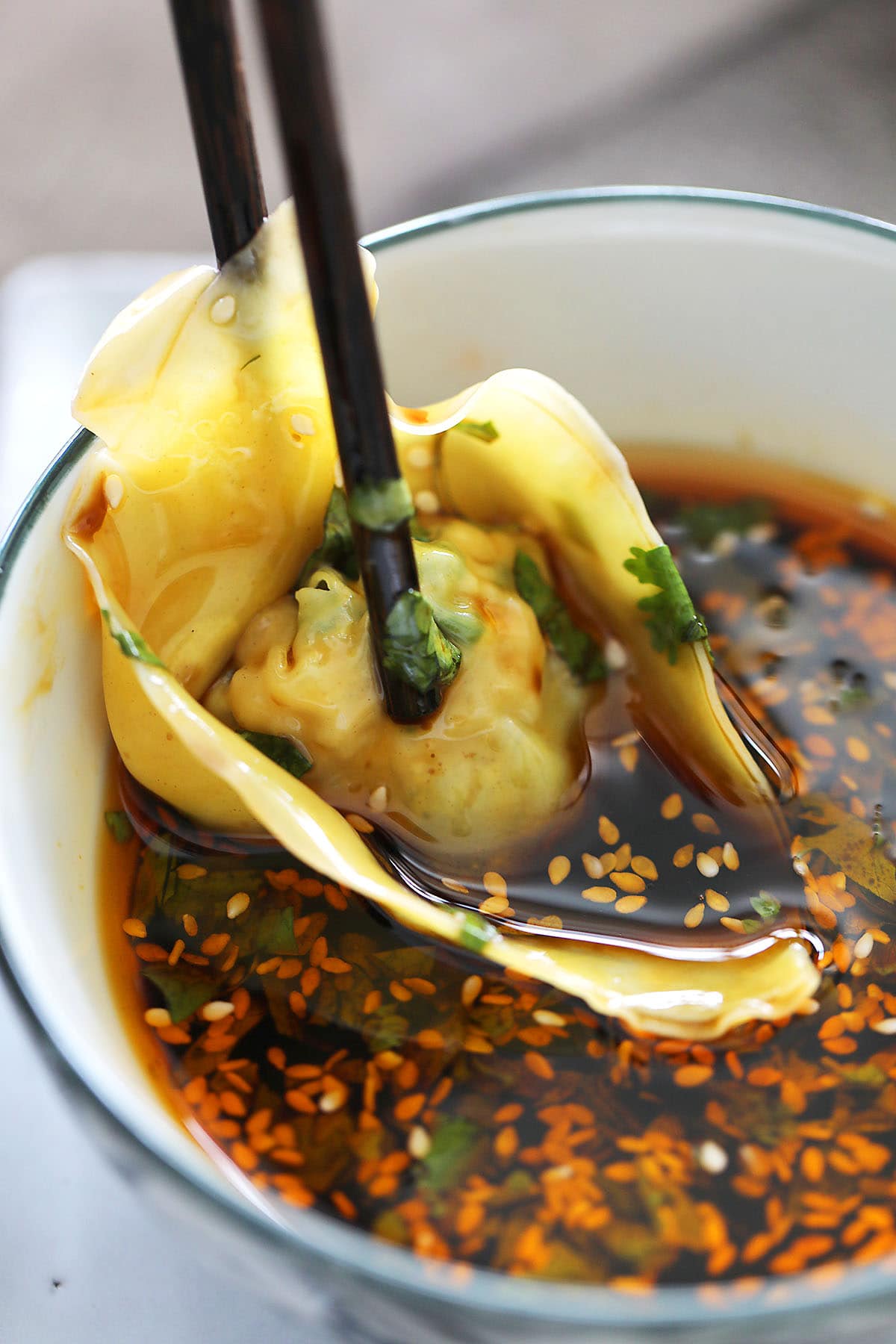 Dumpling dipped in an easy dipping sauce for dumplings.