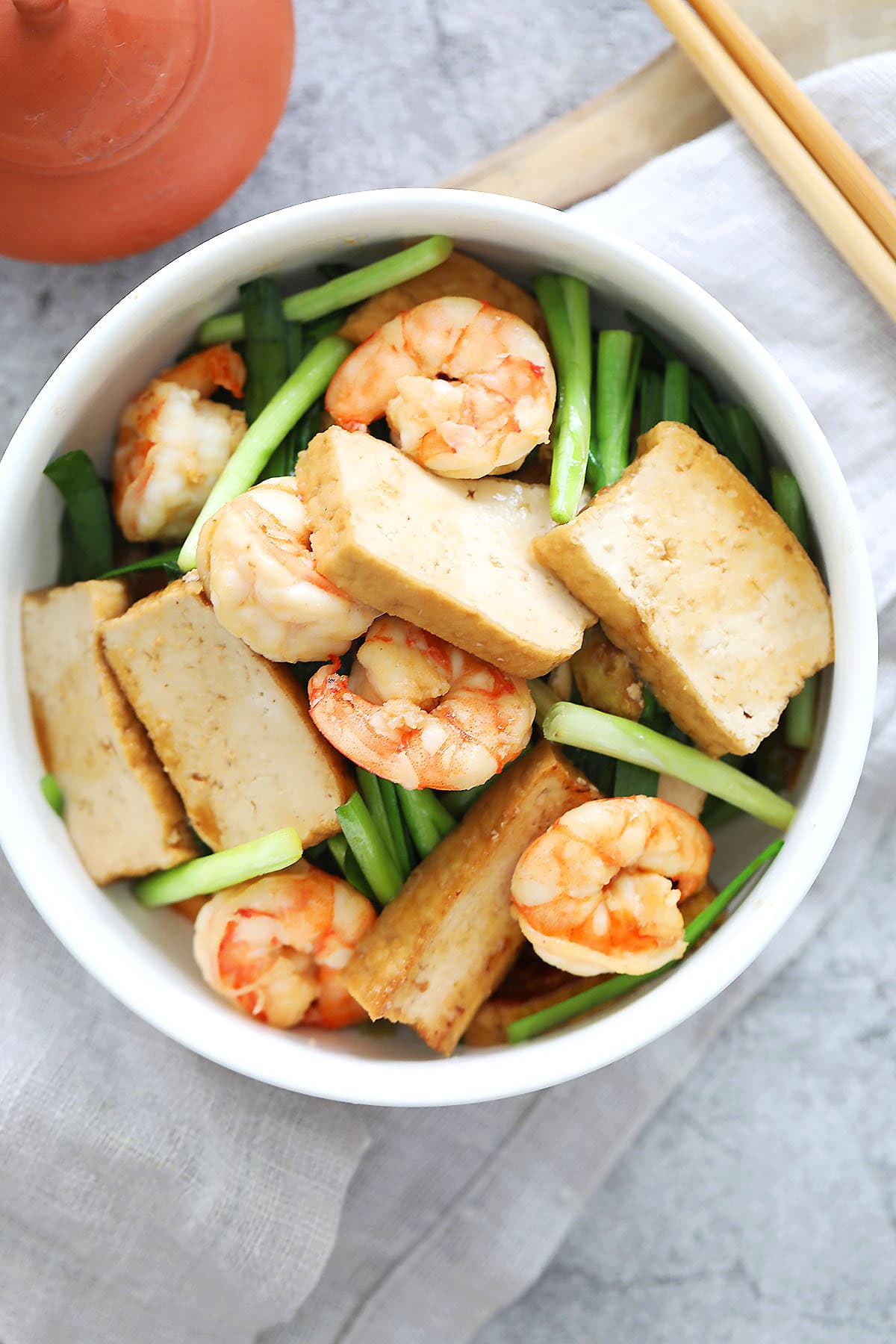Stir fried veggies with tofu served in a bowl.