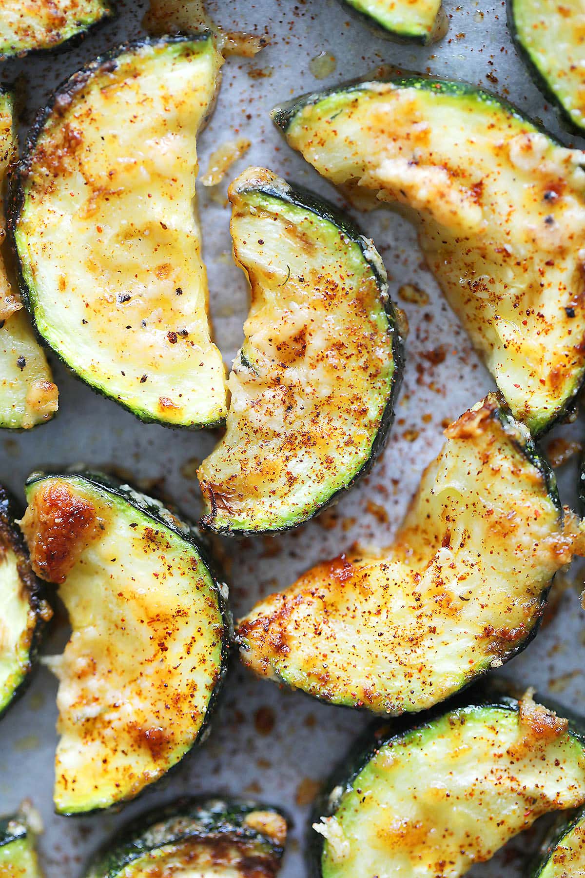 Crispy and tender air fryer zucchini with Parmesan cheese.