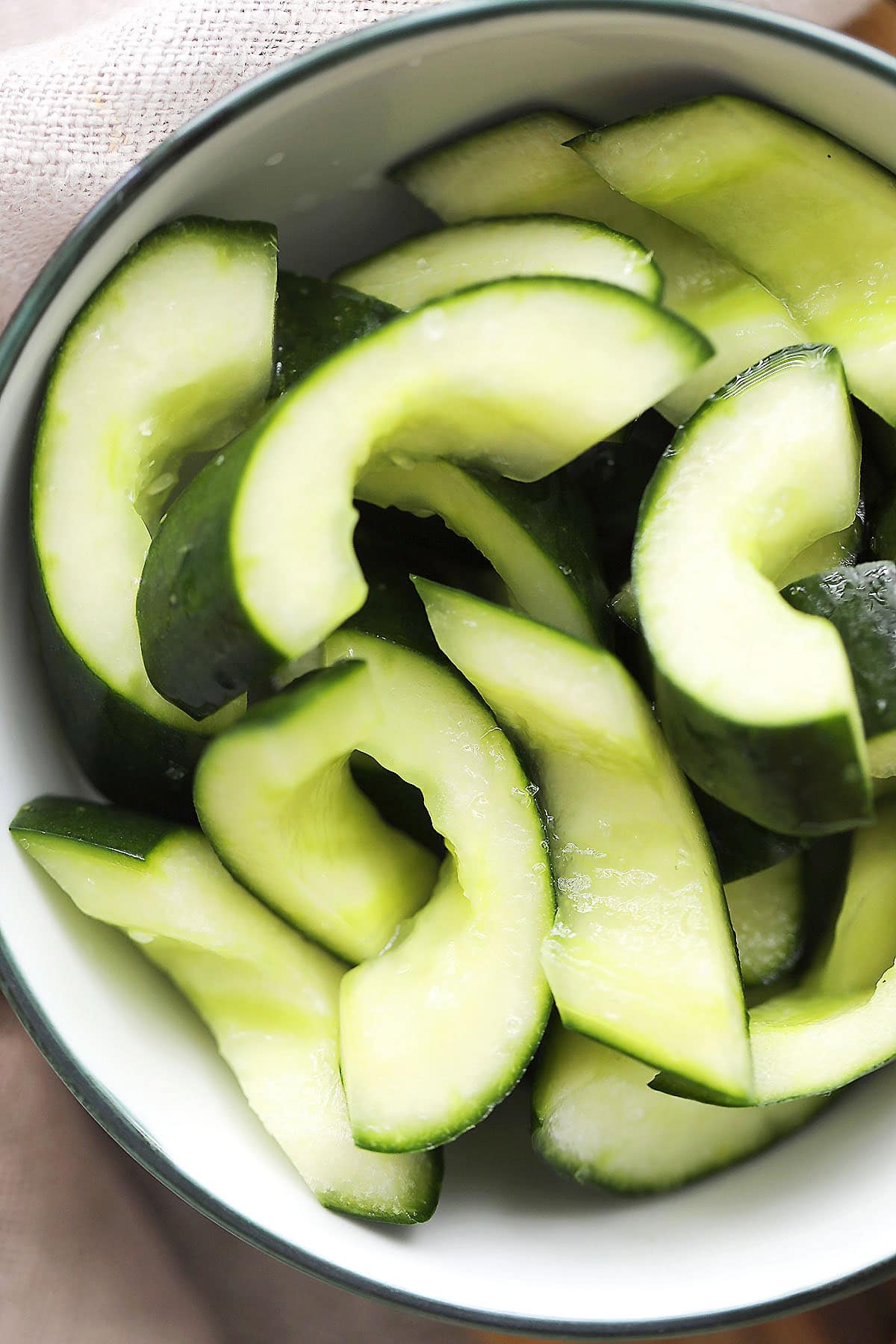 Chinese cucumber salad recipe with Chinese rice vinegar and sugar.