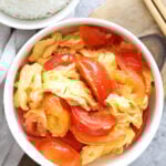 Chinese tomato egg stir fry served in a bowl.