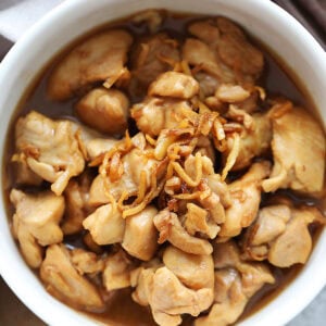 Chinese sesame oil chicken stir fry, served in a bowl.