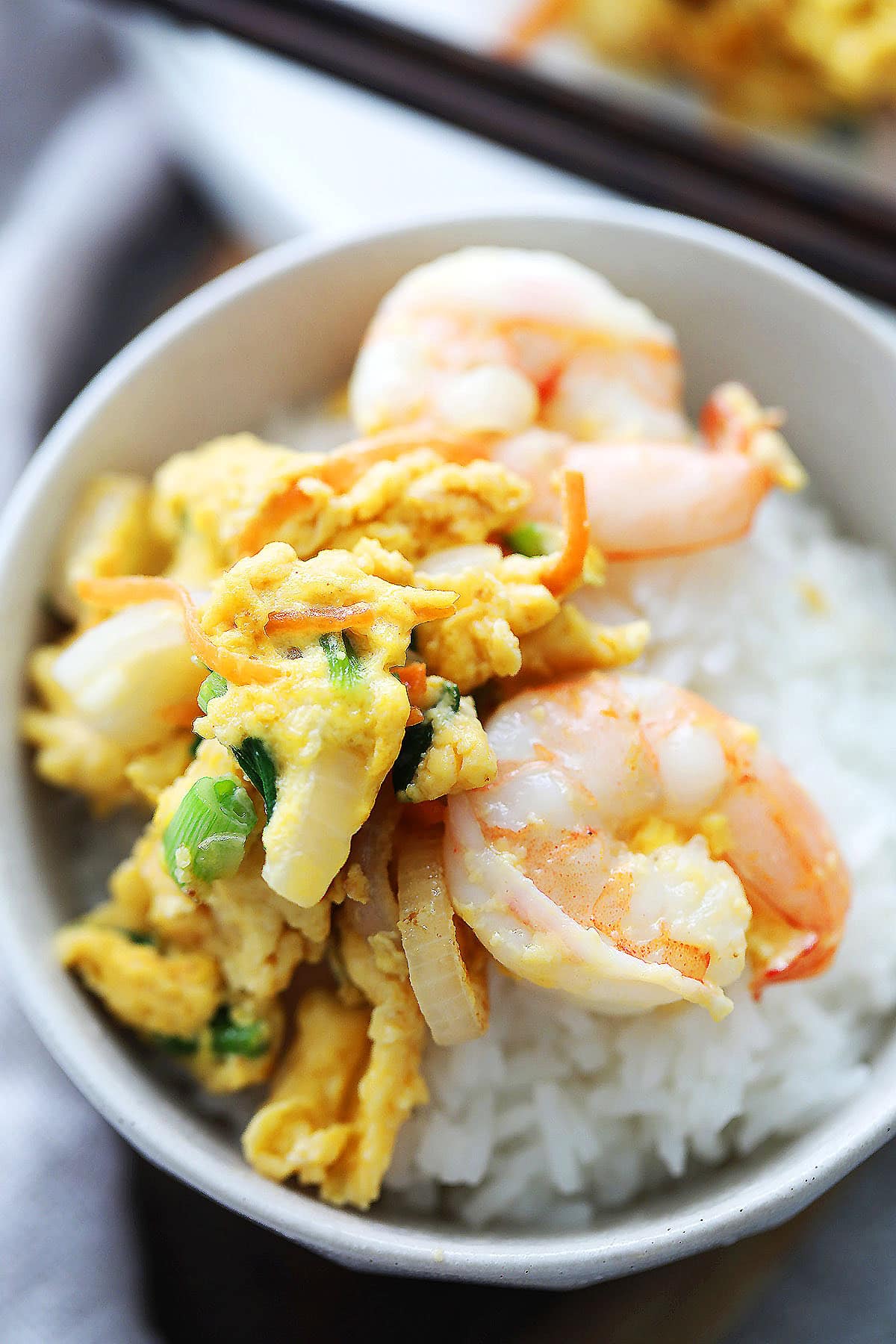 Easy shrimp omelette served over steamed rice.