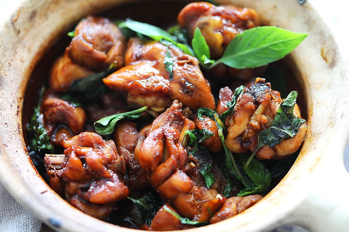 Taiwanese San Bei Ji made with tender chicken drumsticks, rich soy sauce, sesame oil, Shaoxing wine, and fresh basil leaves.