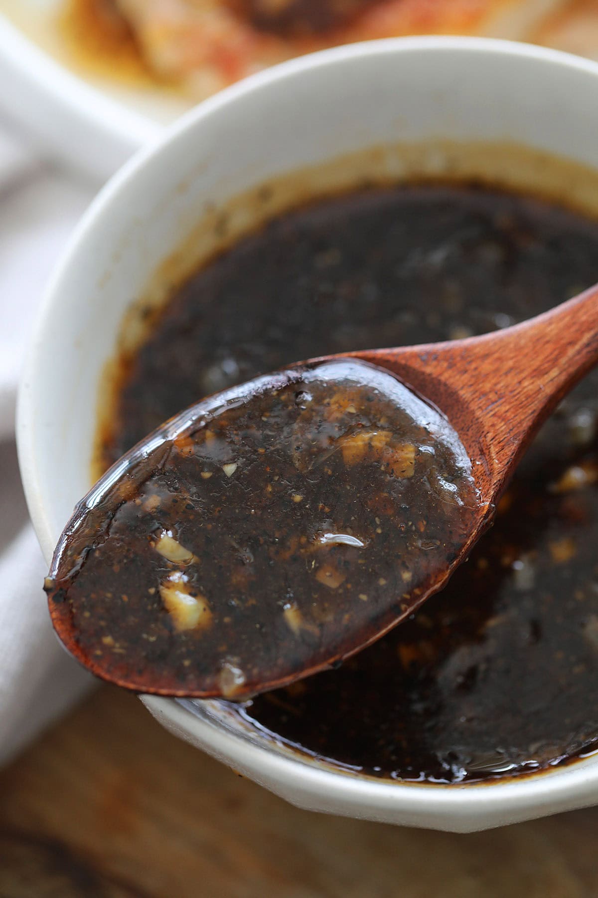 A spoonful of Chinese black pepper sauce.
